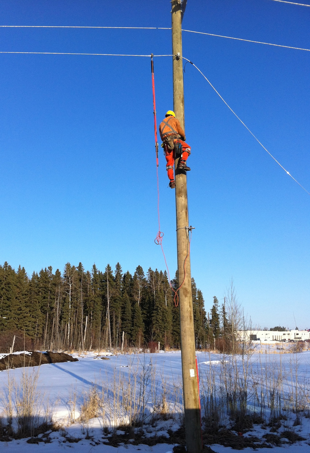 Power Lineman hard at work