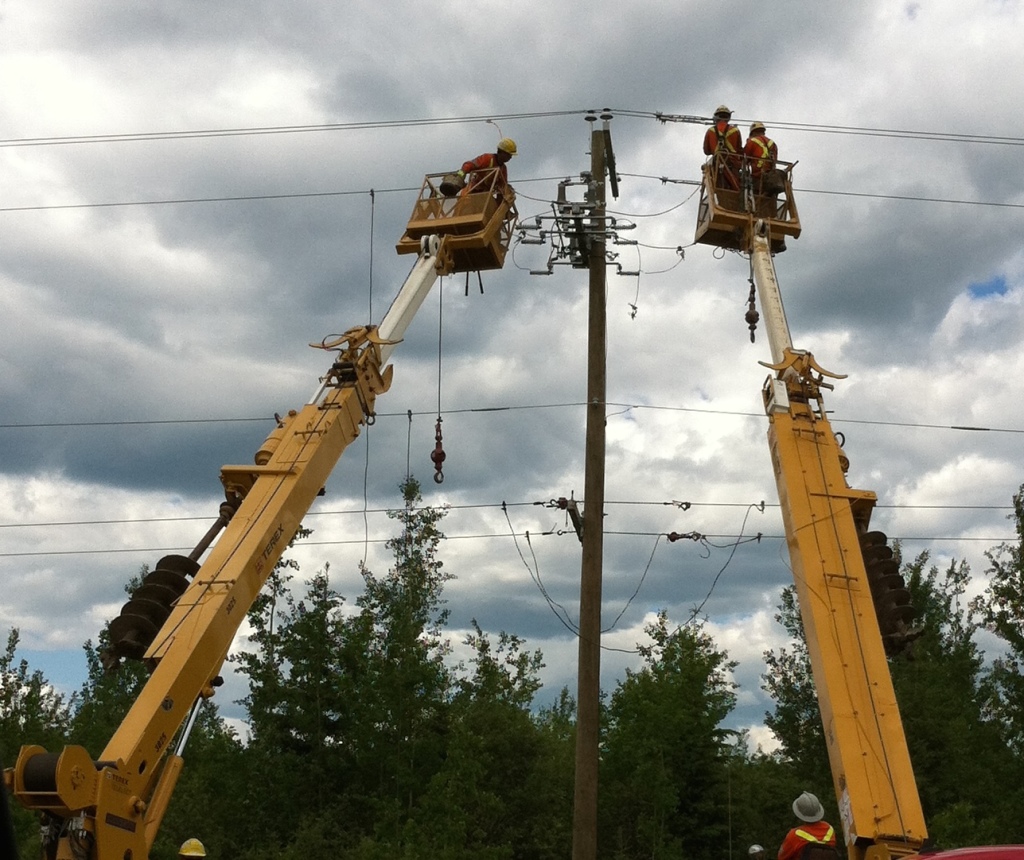 Power Lineman hard at work