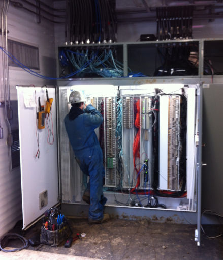 Journeyman Electrician Terminating a PLC